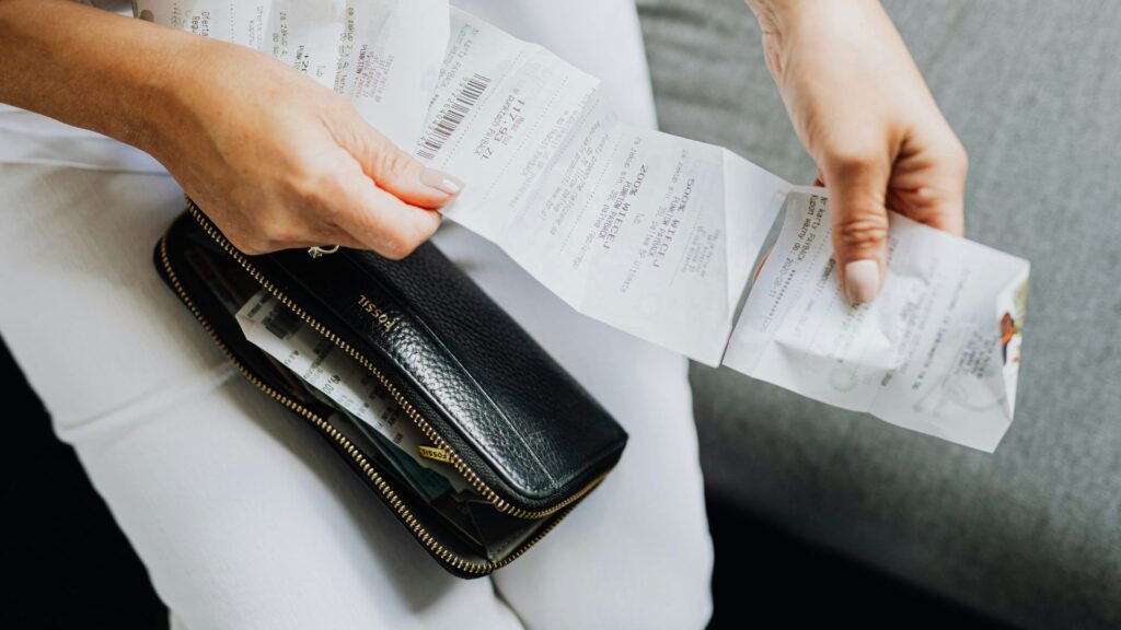A Person Holding a Wallet